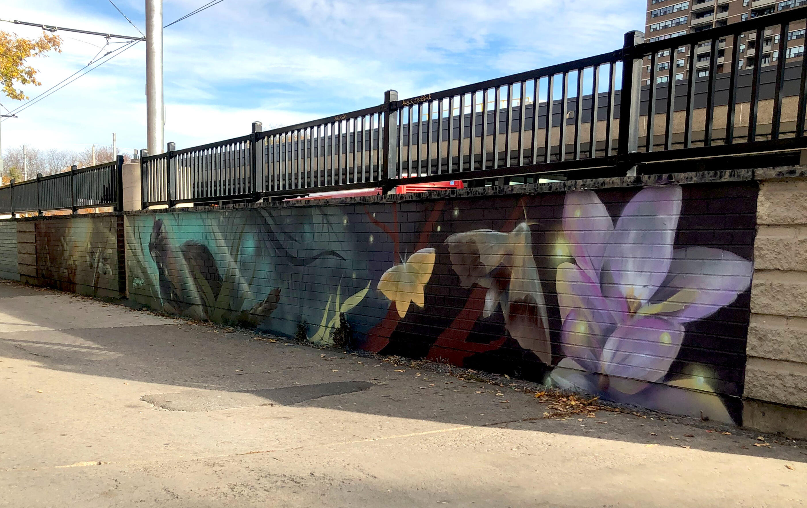“Nature at Dusk” mural painted at Main St. Station for The Laneway Project. 2022